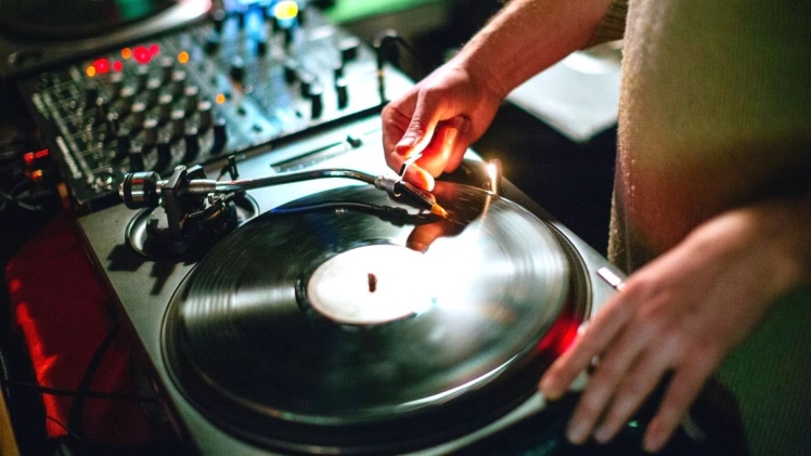 The Evolution Of Djing: Tracing The Journey From Vinyl To Digital.